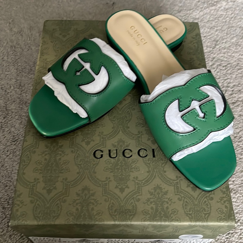 Green interlocking G cut out sandal.